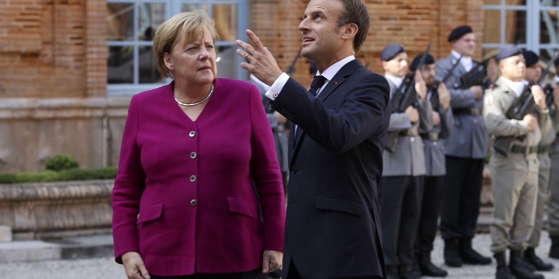Frankrikes president Emmanuel Macron tog emot Tysklands förbundskansler Angela Merkel i den sydliga franska staden Toulouse på onsdagen. 